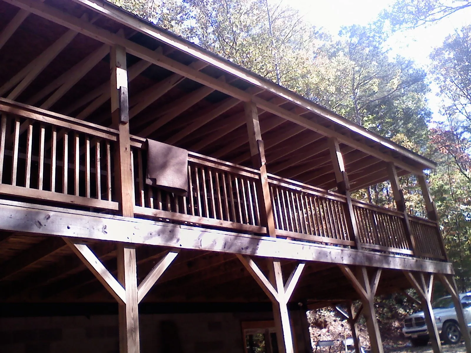 Timber framing under a new elevated porch and deck — Roof Leak Repair in Matherville by Roofing Brothers